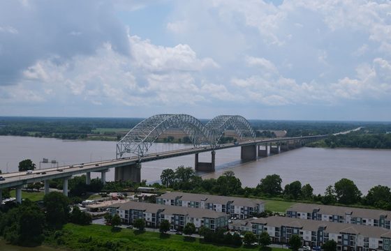 The Mississippi at Memphis with the bridge and the green bank