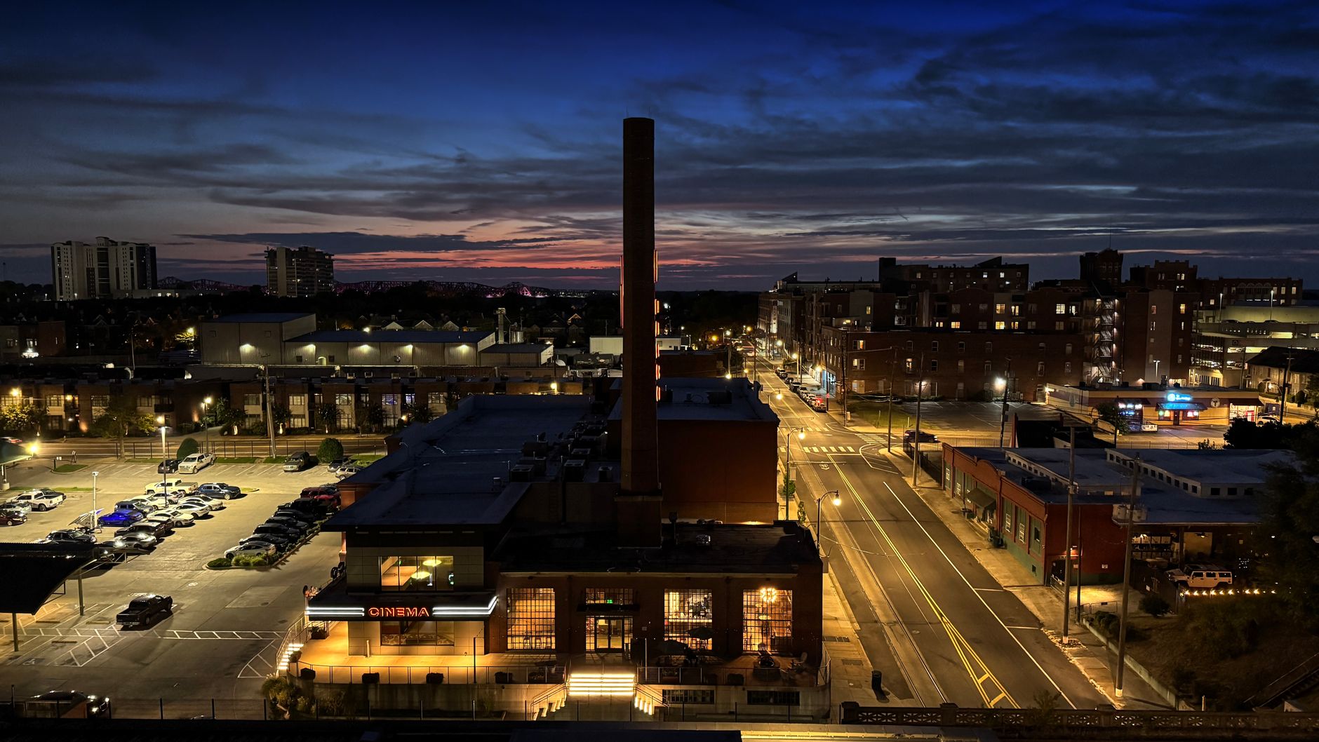 Aerial view of Memphis at night showcasing vibrant city lights and architecture