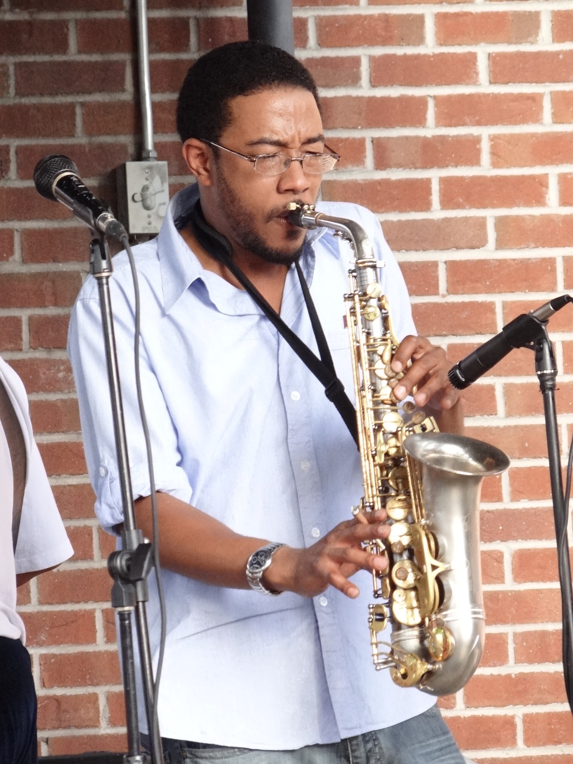 A saxophonist playing in downtown Memphis, Tennessee