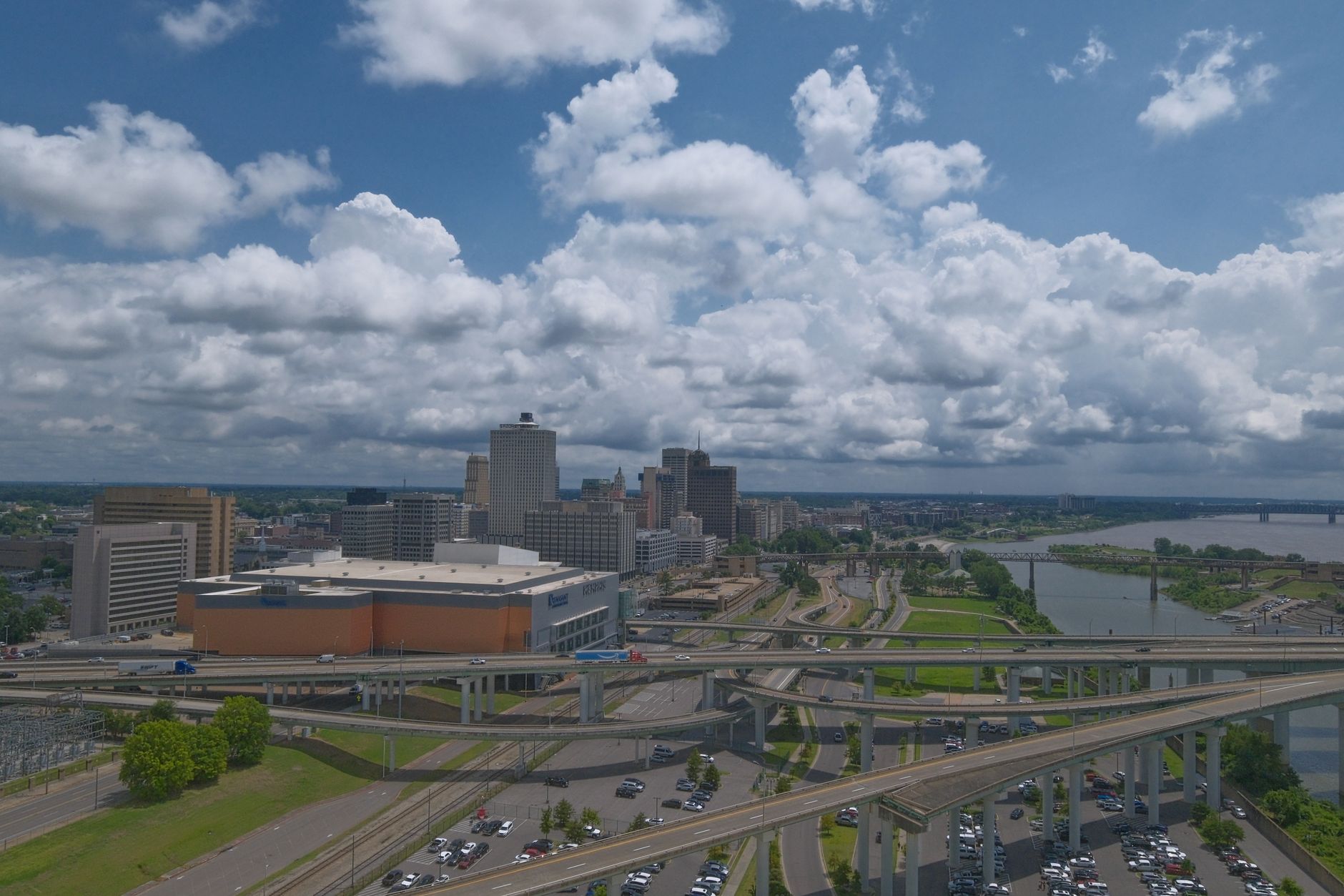 Aerial view of downtown Memphis, Tennessee with highways and skyline on a cloudy day