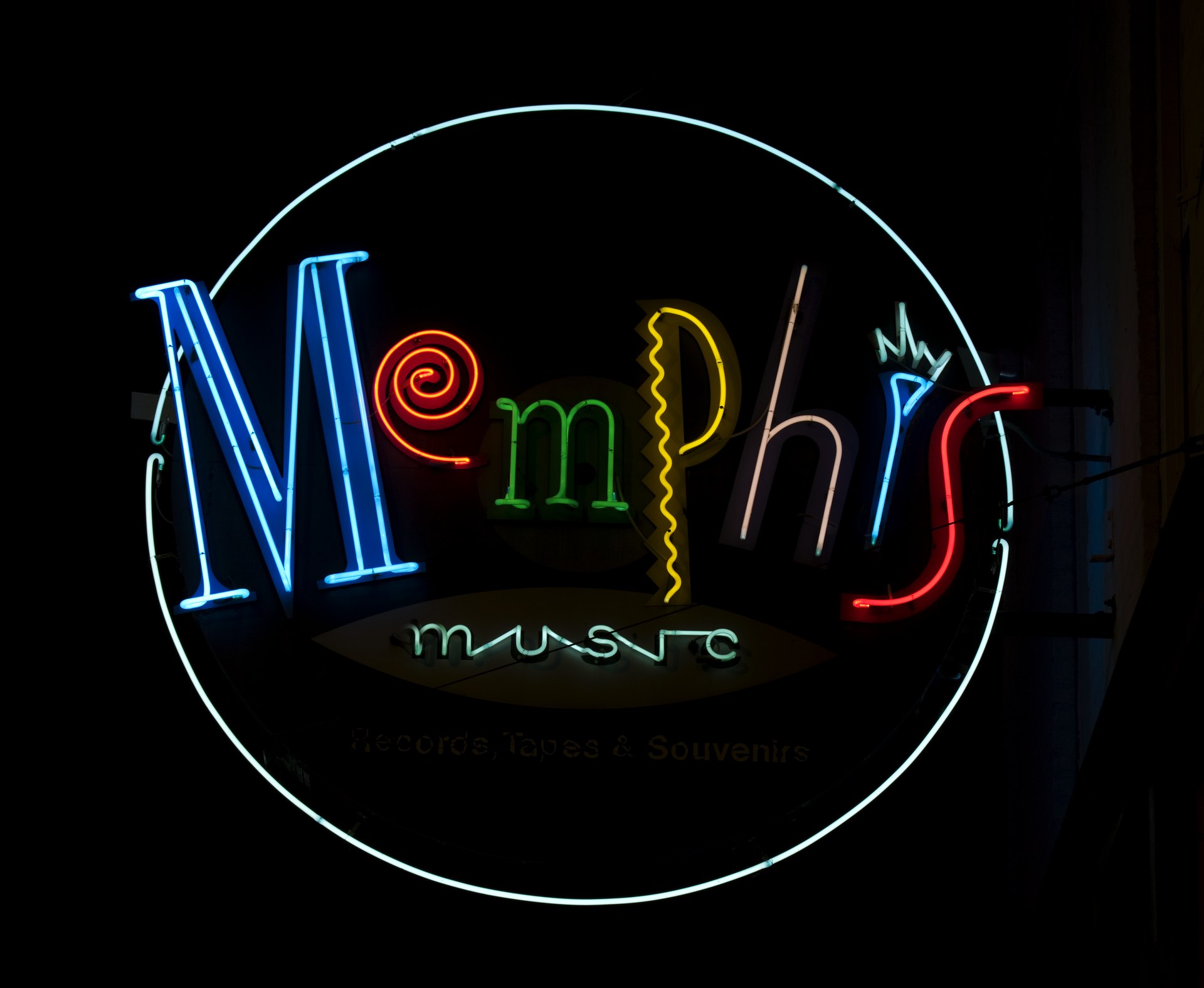 A neon Memphis Music sign on Beale Street
